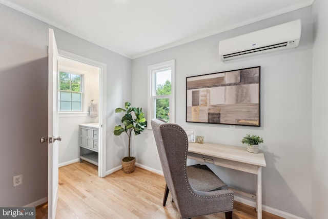 1111 Woodside Pkwy, Silver Spring, MD 20910 - office area with light wood-style floors, baseboards, and a wall mounted air conditioner