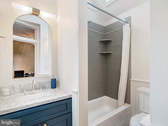 full bathroom with vanity, toilet, and shower / bath combination with curtain
