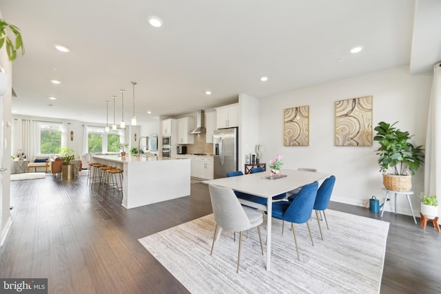 1702 River Sandstone Ter SE, Leesburg, VA 20175 - dining room featuring recessed lighting, dark wood-style floors, and baseboards