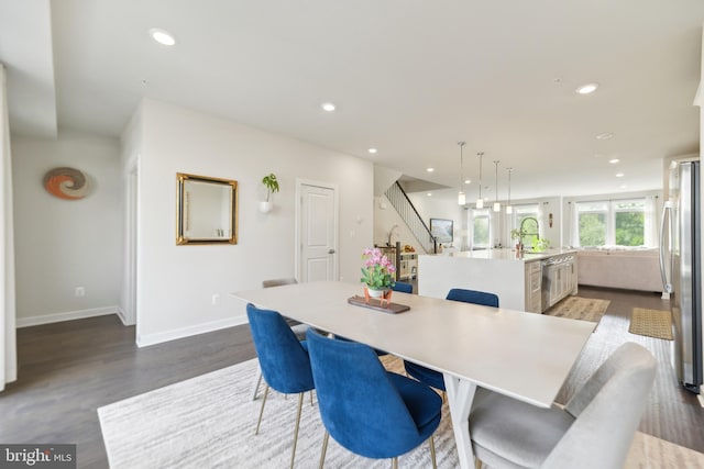 1702 River Sandstone Ter SE, Leesburg, VA 20175 - dining space with dark wood-style floors, recessed lighting, baseboards, and stairs