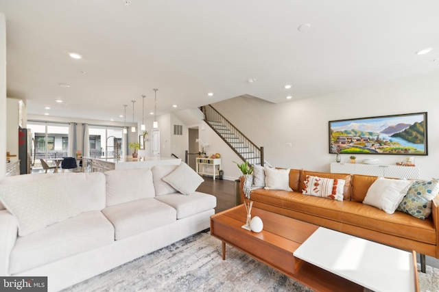 1702 River Sandstone Ter SE, Leesburg, VA 20175 - living area featuring recessed lighting, wood finished floors, and stairs
