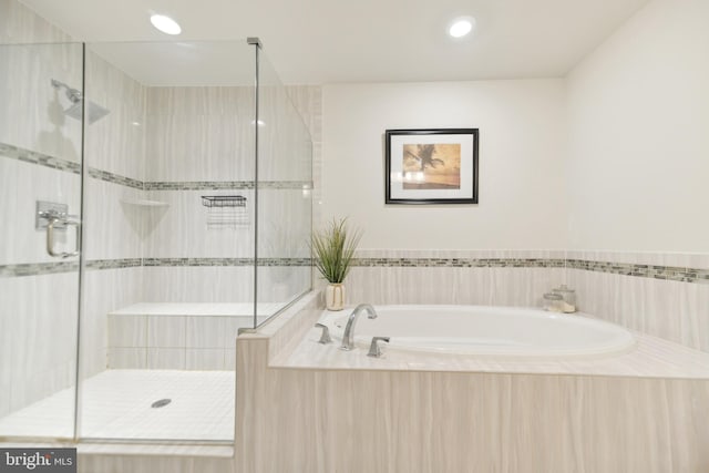 1702 River Sandstone Ter SE, Leesburg, VA 20175 - full bathroom with a stall shower, a garden tub, and recessed lighting