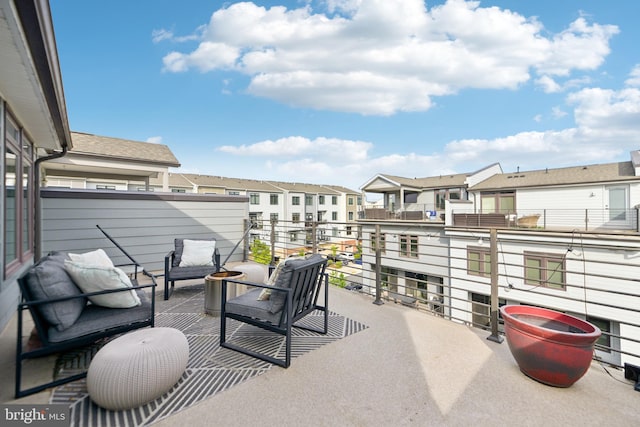1702 River Sandstone Ter SE, Leesburg, VA 20175 - view of patio / terrace with a residential view and a balcony
