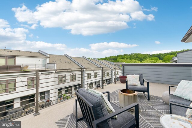 1702 River Sandstone Ter SE, Leesburg, VA 20175 - view of patio with a balcony