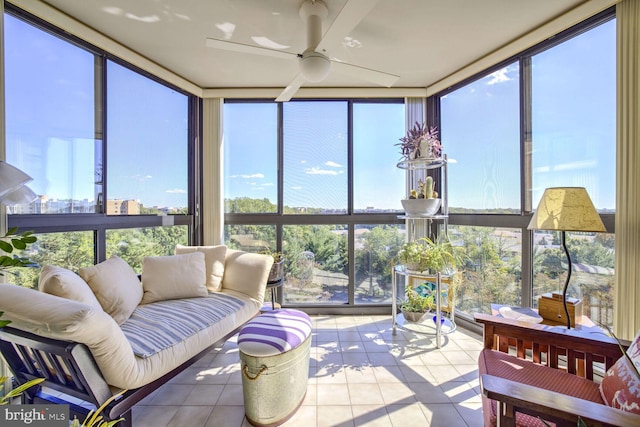 sunroom / solarium with floor to ceiling windows and tile patterned flooring