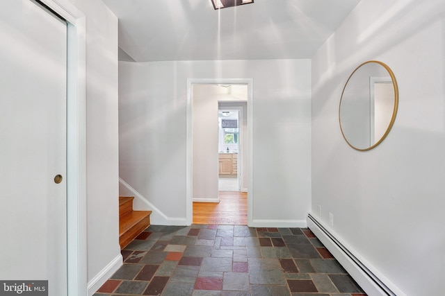 1612 7th Pl, Mclean, VA 22101 - hall with a baseboard heating unit, stone tile floors, baseboards, and stairs