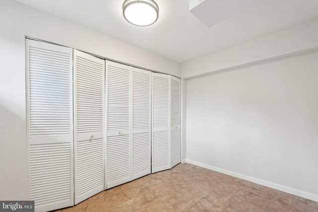 1612 7th Pl, Mclean, VA 22101 - unfurnished bedroom with a closet and baseboards