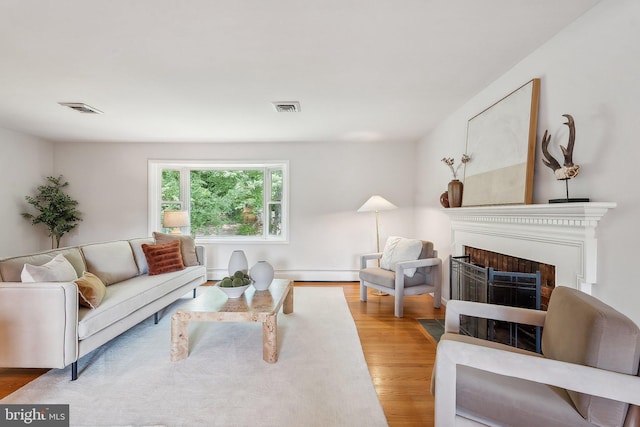1612 7th Pl, Mclean, VA 22101 - living room featuring a fireplace and wood finished floors