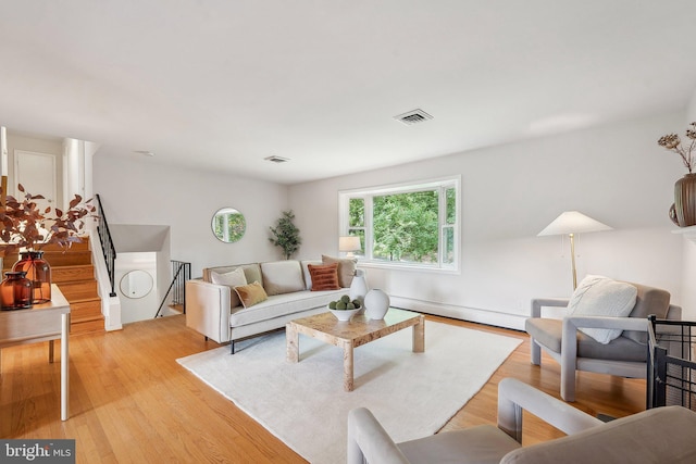 1612 7th Pl, Mclean, VA 22101 - living area with a baseboard radiator and light wood-type flooring