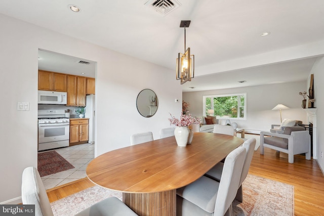 1612 7th Pl, Mclean, VA 22101 - dining space with light wood finished floors and recessed lighting