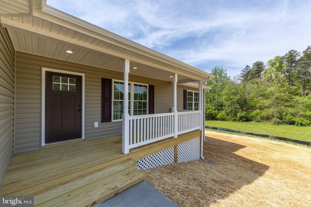 property entrance featuring covered porch