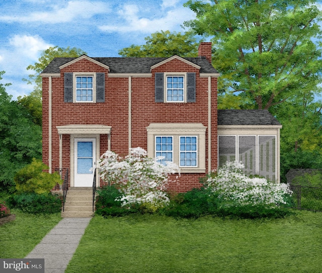 view of front of home with a chimney, brick siding, and a sunroom