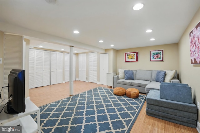 living area featuring recessed lighting and wood finished floors