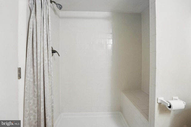 bathroom featuring a stall shower