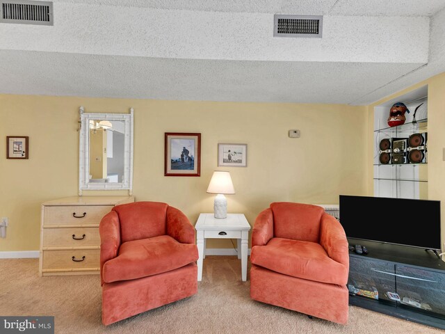 13400 Coastal Hwy Unit N405, Ocean City, MD 21842 - sitting room featuring visible vents, carpet, and baseboards
