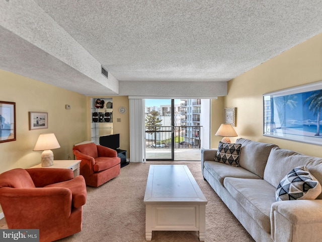 13400 Coastal Hwy Unit N405, Ocean City, MD 21842 - carpeted living area featuring a textured ceiling and visible vents