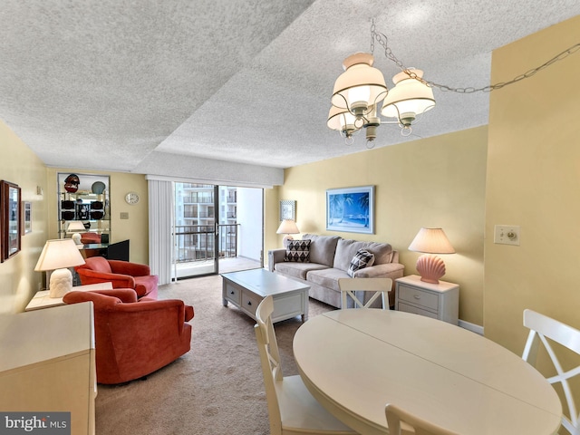 13400 Coastal Hwy Unit N405, Ocean City, MD 21842 - living area featuring carpet, a textured ceiling, and a chandelier