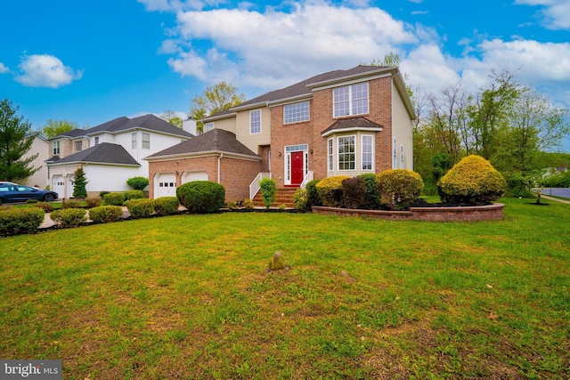 24 Chesapeake Rd, Monmouth Junction, NJ 08852 - view of front facade with brick siding, a front lawn, and an attached garage