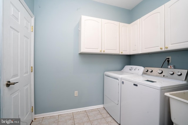 24 Chesapeake Rd, Monmouth Junction, NJ 08852 - washroom with a sink, cabinet space, independent washer and dryer, light tile patterned flooring, and baseboards