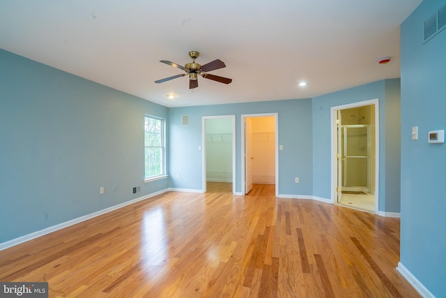 24 Chesapeake Rd, Monmouth Junction, NJ 08852 - unfurnished bedroom with recessed lighting, light wood-style floors, visible vents, baseboards, and a spacious closet