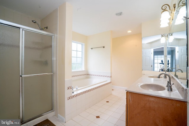24 Chesapeake Rd, Monmouth Junction, NJ 08852 - full bath with tile patterned floors, a shower stall, double vanity, a bath, and a sink