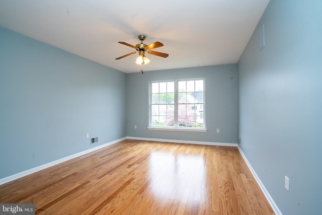 24 Chesapeake Rd, Monmouth Junction, NJ 08852 - unfurnished room featuring visible vents, baseboards, ceiling fan, and light wood-type flooring