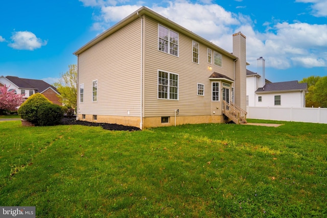 24 Chesapeake Rd, Monmouth Junction, NJ 08852 - rear view of property featuring a yard, entry steps, and fence