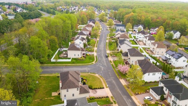 24 Chesapeake Rd, Monmouth Junction, NJ 08852 - drone / aerial view featuring a wooded view and a residential view
