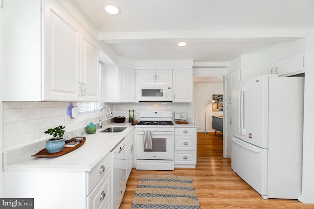4 Hallbrook Ct, Baltimore, MD 21236 - kitchen with a sink, white appliances, light countertops, white cabinetry, and light wood-type flooring