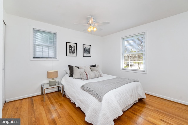4 Hallbrook Ct, Baltimore, MD 21236 - bedroom with baseboards, a ceiling fan, and light wood-type flooring