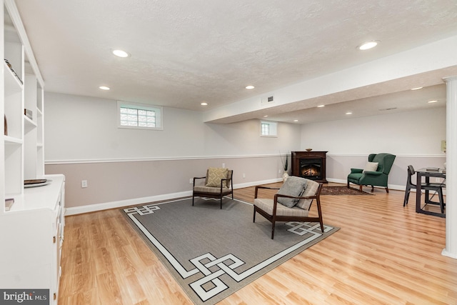 4 Hallbrook Ct, Baltimore, MD 21236 - sitting room featuring visible vents, recessed lighting, light wood finished floors, and a warm lit fireplace