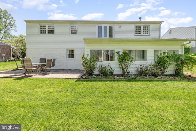 4 Hallbrook Ct, Baltimore, MD 21236 - back of house featuring a lawn and a patio