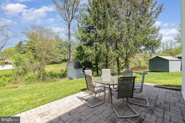4 Hallbrook Ct, Baltimore, MD 21236 - view of patio featuring an outdoor structure, a shed, and outdoor dining space