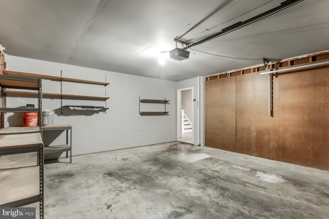 garage featuring a garage door opener