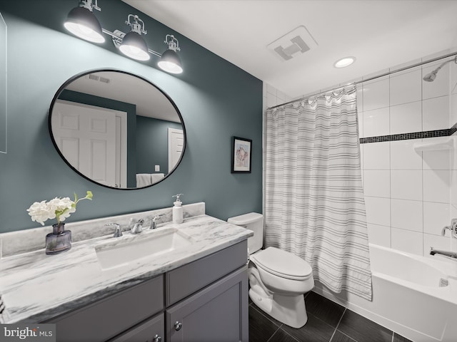 full bathroom featuring visible vents, shower / bath combo, toilet, and vanity