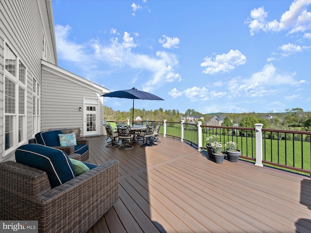 deck with outdoor dining space