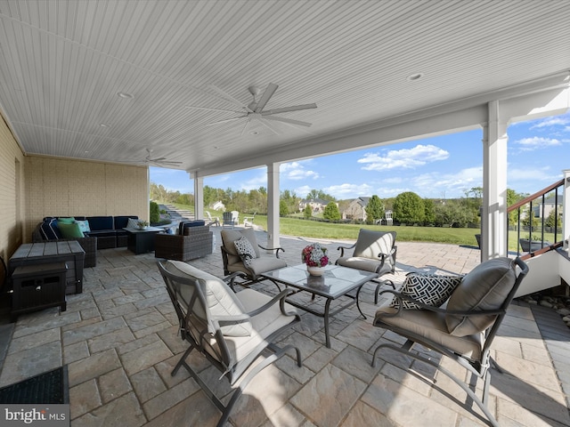 view of patio / terrace with ceiling fan and outdoor lounge area