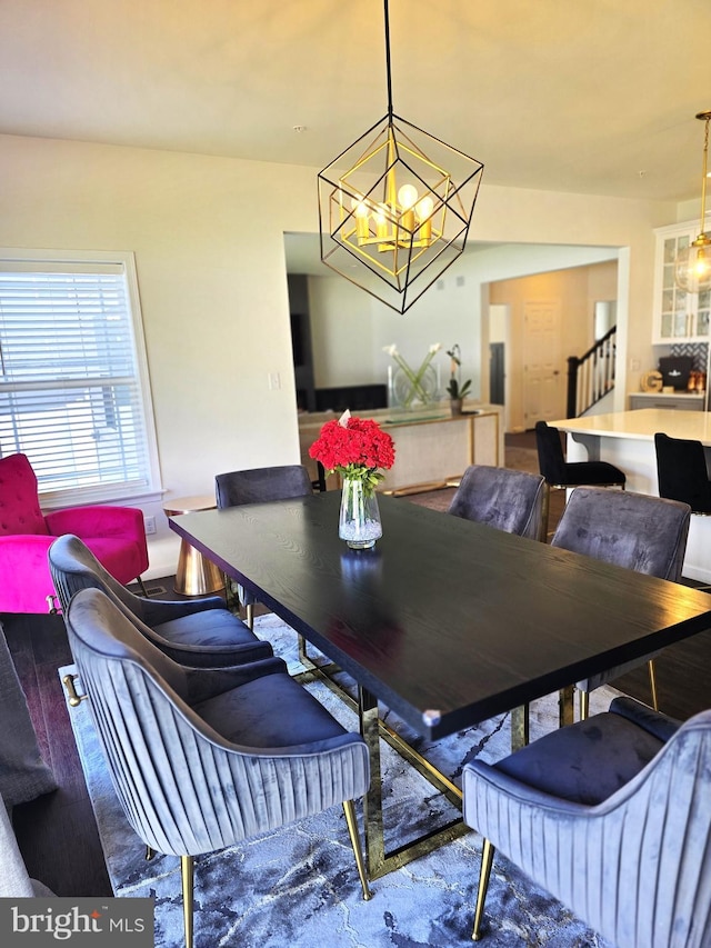 101 Saratoga Ct, North East, MD 21901 - dining space with stairway and an inviting chandelier