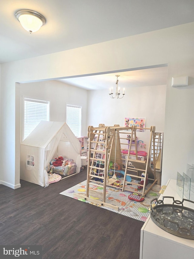 101 Saratoga Ct, North East, MD 21901 - recreation room with a chandelier, baseboards, and wood finished floors