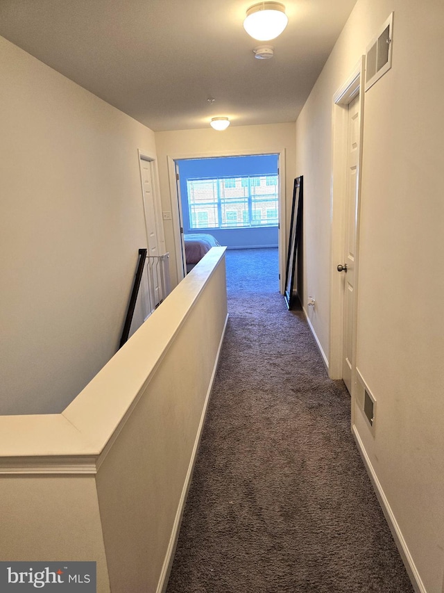 101 Saratoga Ct, North East, MD 21901 - hall featuring baseboards, visible vents, and dark carpet