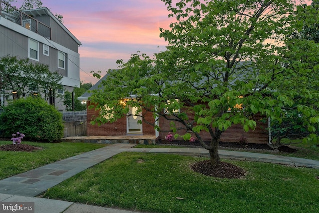 1310 S Columbus St, Arlington, VA 22204 - view of front of property with brick siding, fence, and a front yard