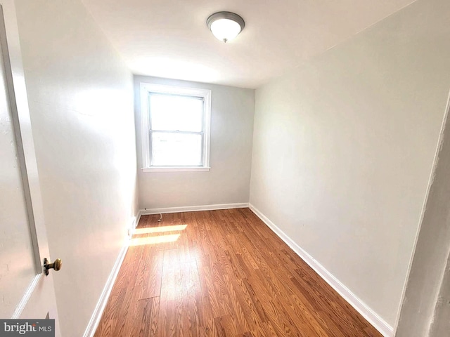 7107 Oakland St, Philadelphia, PA 19149 - empty room with wood finished floors and baseboards