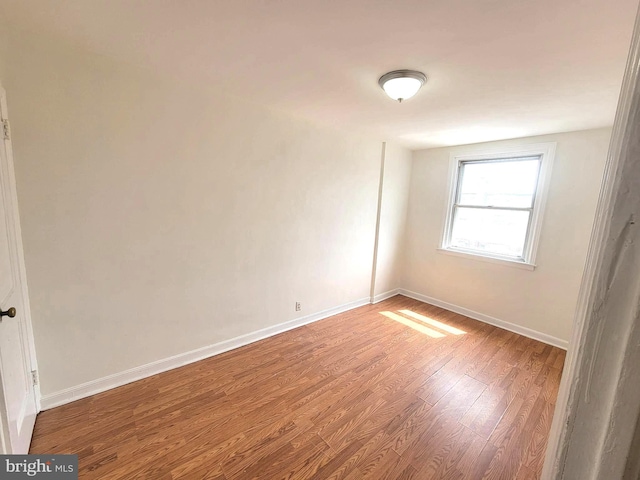7107 Oakland St, Philadelphia, PA 19149 - unfurnished room featuring baseboards and wood finished floors