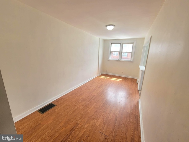 7107 Oakland St, Philadelphia, PA 19149 - unfurnished room with visible vents, light wood-type flooring, and baseboards