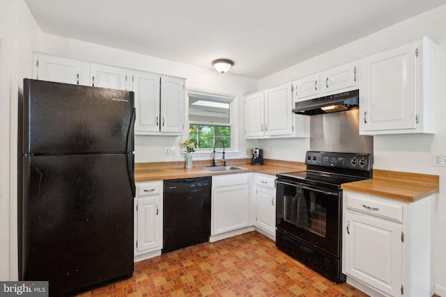 1321 Bayshire Ln, Herndon, VA 20170 - kitchen with black appliances, under cabinet range hood, a sink, wooden counters, and white cabinetry