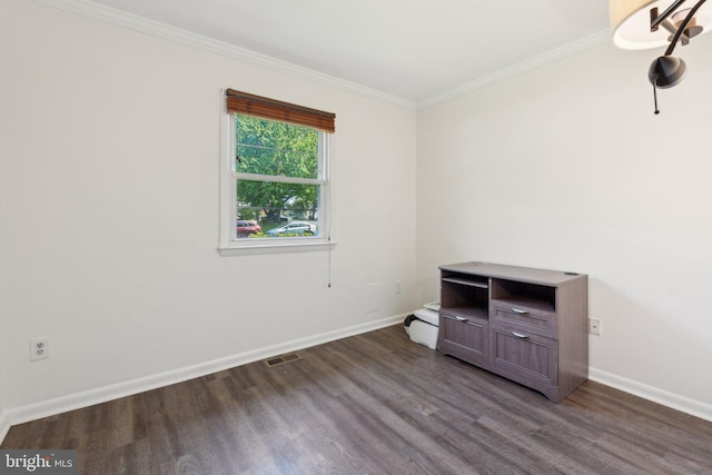 1321 Bayshire Ln, Herndon, VA 20170 - empty room featuring dark wood-type flooring, crown molding, and baseboards