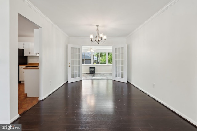 1321 Bayshire Ln, Herndon, VA 20170 - unfurnished dining area with wood finished floors, a chandelier, ornamental molding, baseboards, and french doors