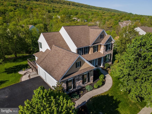 bird's eye view with a forest view