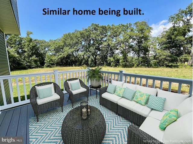wooden deck featuring an outdoor living space and a yard