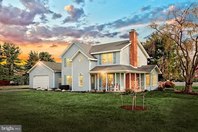 3330 Lewisberry Rd, York, PA 17404 - rear view of house featuring a lawn, a chimney, and a porch